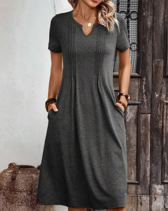 Kleid mit einfarbiger Taillentasche