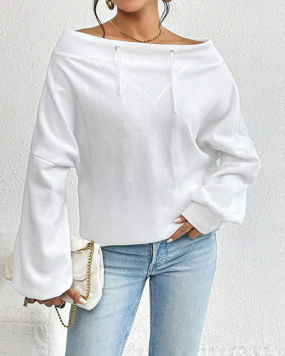 Modisches, einfarbiges sweatshirt mit one-shoulder-ärmel und kordelzug