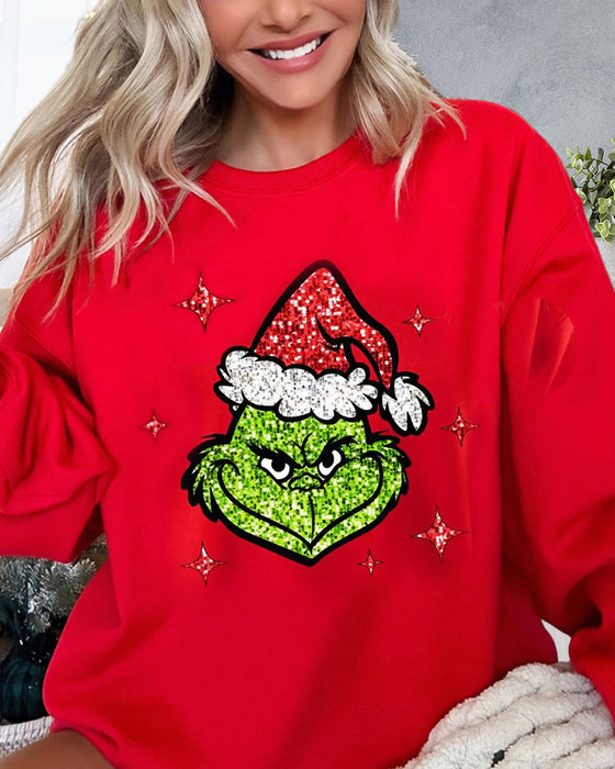 Weihnachtspullover mit Grinch-Gesicht und Glitzer