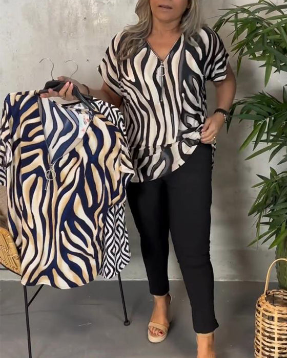 Modische bluse mit V-ausschnitt und reißverschluss im zebra-print