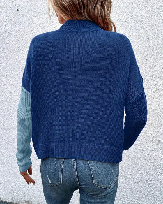 Rollkragenpullover mit farbblockmuster und kreuzmuster