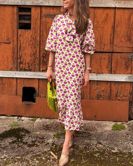 Elegantes kleid mit puffärmeln und print