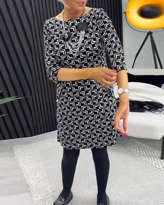 Retro-Kleid mit Rundhalsausschnitt und Tasche und geometrischem Print