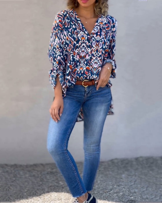 Bluse mit V-Ausschnitt und Blumenmuster und langen Ärmeln